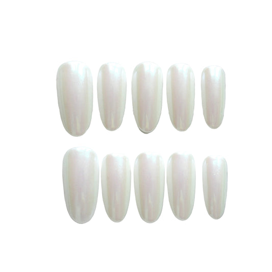 Set of white nail extensions in a clear case on a light gray background